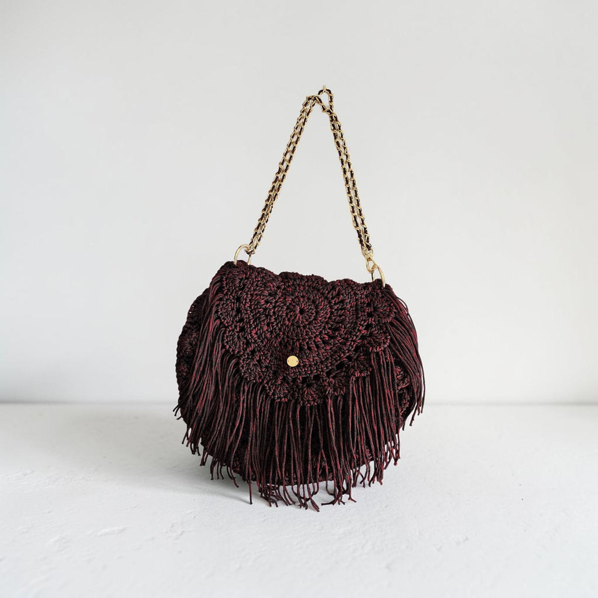 Jani half round bag