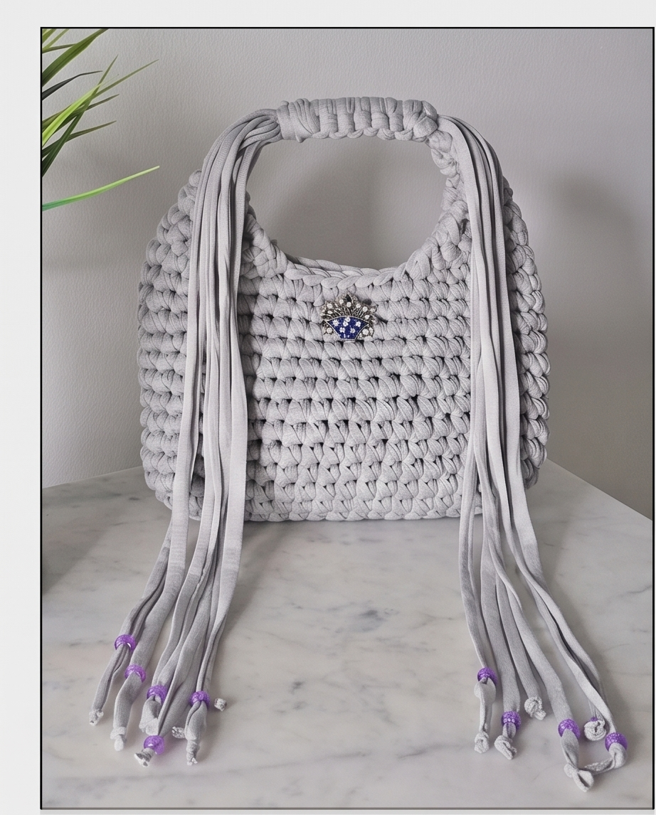 Adjustable handle bag